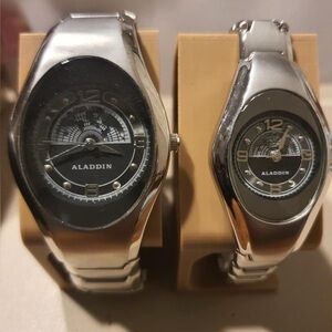 Vintage Aladdin Casino His & Her's Silver/Grey Stainless Steel Watch Set